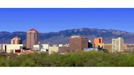 Albuquerque, New Mexico skyline with mountains.