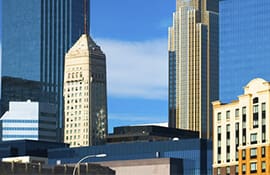 Tall buildings in a city skyline.