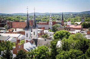 Aerial view of a small town with churches.